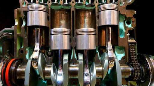 real image of heat engine or car engine showing piston cylinder and crank shaft